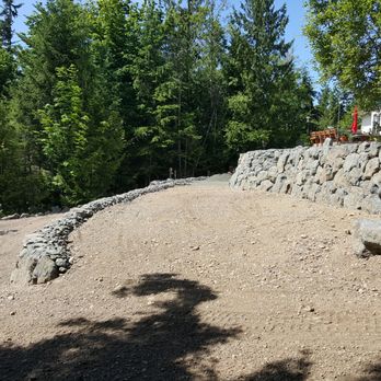 Evans Earthworks - a stone wall and a stone fence - Gardeners Near Me - Port Angeles, Washington Evans Earthworks - a stone wall and a stone fence - Gardeners Near Me - Port Angeles, Washington