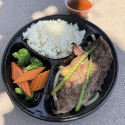 Sizzling Beef Steak Plate - Really good and tender! Crisp veggies. Good butter and sauce. Sizzling Beef Steak Plate - Really good and tender! Crisp veggies. Good butter and sauce.