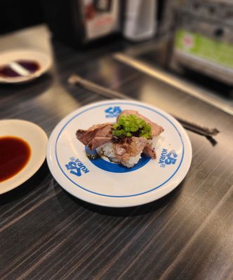 Kura Revolving Sushi Bar by null