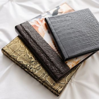 Boudoir By Samantha - 3 beautiful boudoir albums laying on bed - Boudoir Photography Near Me - San Antonio, Texas Boudoir By Samantha - 3 beautiful boudoir albums laying on bed - Boudoir Photography Near Me - San Antonio, Texas