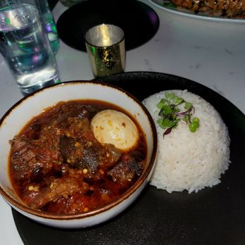 Lagos TSQ - Ofada stew w white rice - African Near Me - New York, New York Lagos TSQ - Ofada stew w white rice - African Near Me - New York, New York