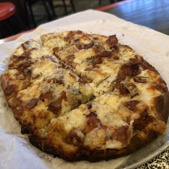 Back Unturned Brewing - Formaggio Bacon on flatbread: White sauce, ricotta, mozzarella, parmigiana, bacon, fresh rosemary - Brewpubs Near Me - San Antonio, Texas