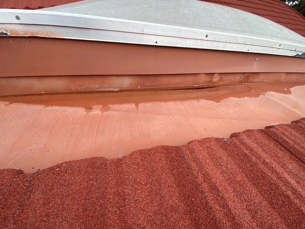 Slide of Adams Roofing