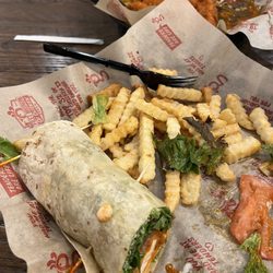 It is a buffalo chicken wrap, with tomatoes, their special ranch, a wrap, lettuce, and some spicy chicken tenders!!