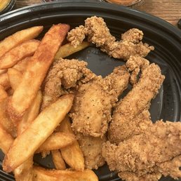 This was supposed to be Chicken tenders and fries. It's more like calamari and fries This was supposed to be Chicken tenders and fries. It's more like calamari and fries