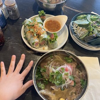 Pho Momma - Hand comparison of the XS for soup sizes - Noodles Near Me - Sacramento, California