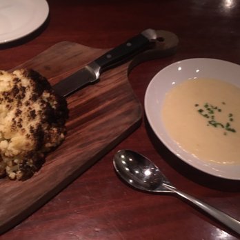 Seasons 52 - Whole Roasted Cauliflower with cheese on the side - New American Near Me - Altamonte Springs, Florida Seasons 52 - Whole Roasted Cauliflower with cheese on the side - New American Near Me - Altamonte Springs, Florida