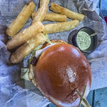 Tiki Docks Skyway - Grouper Sandwich with Yuca Fries - Tiki Bars Near Me - St. Petersburg, Florida Tiki Docks Skyway - Grouper Sandwich with Yuca Fries - Tiki Bars Near Me - St. Petersburg, Florida