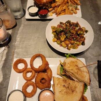 Colton's Social House - Garlic Fries, Therapy Burger, Onion Rings, Spicy Chicken BLT, Carmalized Brussel Sprouts with Bacon. Absolutely amazing! - New American Near Me - Clovis, California