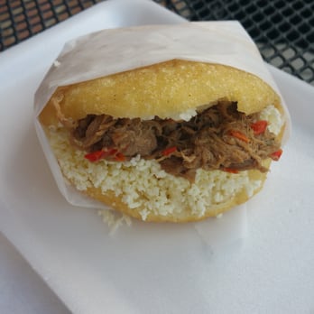 Arrechissimo Restaurant - Arepa Peluda - with the spicy cilantro sauce, it's truly amazing. - Venezuelan Near Me - Cincinnati, Ohio Arrechissimo Restaurant - Arepa Peluda - with the spicy cilantro sauce, it's truly amazing. - Venezuelan Near Me - Cincinnati, Ohio