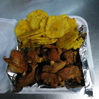 Chimi Tropical - a tray of food on a table - Dominican Near Me - Tampa, Florida Chimi Tropical - a tray of food on a table - Dominican Near Me - Tampa, Florida
