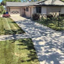 Bradley Marshall Roofing - This is the new roof  and gutters that Brad did last summer for my house. He was professional and very knowledgeable.