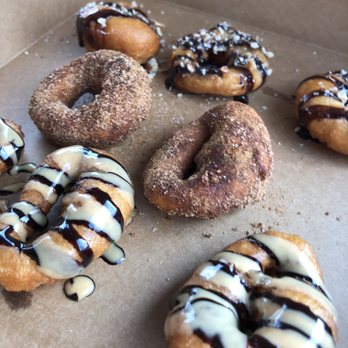 Cafe Dew - Got the turtle donuts and peanut butter chocolate also the ones in the middle are cinnamon sugar - Coffee & Tea Near Me - Webster, Texas Cafe Dew - Got the turtle donuts and peanut butter chocolate also the ones in the middle are cinnamon sugar - Coffee & Tea Near Me - Webster, Texas