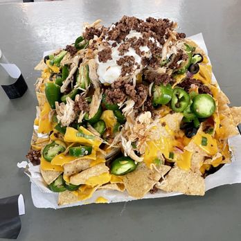 Hops Sports Grill - HUGE platter of nachos! 7 of us couldn't get through it! - Sports Bars Near Me - Tucson, Arizona Hops Sports Grill - HUGE platter of nachos! 7 of us couldn't get through it! - Sports Bars Near Me - Tucson, Arizona