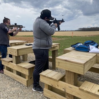 EGA Defense - Here you see one shooter with an IWI Tavor and another with a .300 blackout pistol. 4 shooting benches ready to use. - Gun/Rifle Ranges Near Me - London, Ohio EGA Defense - Here you see one shooter with an IWI Tavor and another with a .300 blackout pistol. 4 shooting benches ready to use. - Gun/Rifle Ranges Near Me - London, Ohio