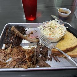 Barbwire Barbecue - Couldn't put the rib down to take the picture. So tender and flavorable.