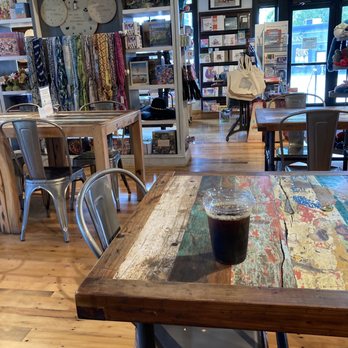 An Unlikely Story - Tables and coffee - Coffee & Tea Near Me - Plainville, Massachusetts