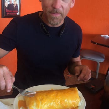 La Garita Restaurant - Tom attacking the big delicious chicken burrito - Tex-Mex Near Me - Killeen, Texas