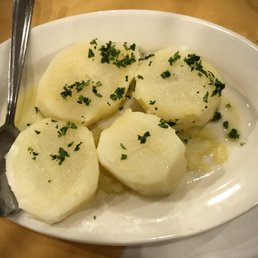 Side of potatoes that comes with the seafood stew
