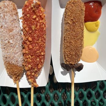 Seoul Hotdog - Sugar rice cake, hot Cheetos all mozzarella, spicy squid ink - Hot Dogs Near Me - Berkeley, California Seoul Hotdog - Sugar rice cake, hot Cheetos all mozzarella, spicy squid ink - Hot Dogs Near Me - Berkeley, California
