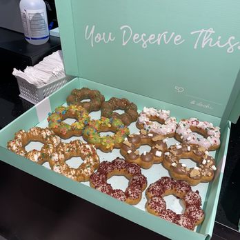 Dochi - Flavors: white chocolate gingerbread, merry matcha, ube glazed, strawberry pretzels, peppermint cocoa, and coffee red velvet - Donuts Near Me - Seattle, Washington
