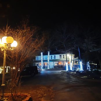 Whispering Pines Restaurant - The Inn driving in at night. - Bed & Breakfast Near Me - Norman, Oklahoma