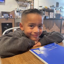 Elite Barbershop - Hair cut by Theron