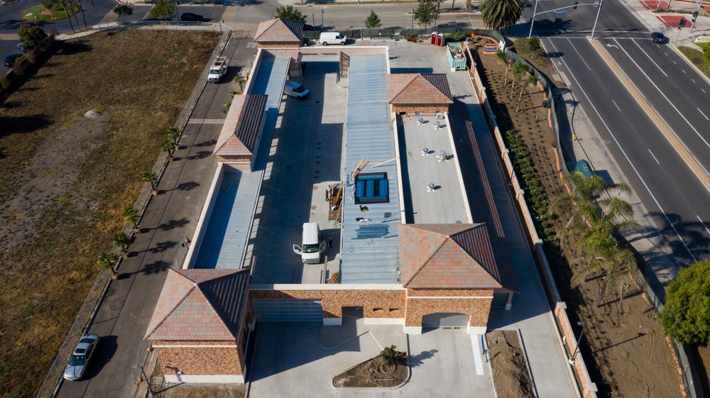 Slide of Genesis Pro Roofing