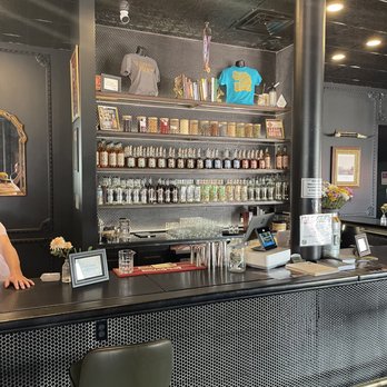 WanderFolk Distillery - a woman behind the bar - Distilleries Near Me - Guthrie, Oklahoma WanderFolk Distillery - a woman behind the bar - Distilleries Near Me - Guthrie, Oklahoma