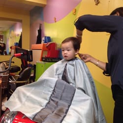 Jandee Kids Haircuts - Perfect for boys as there are cars to sit in and boosters chairs.  Also a phone holder to distraction.