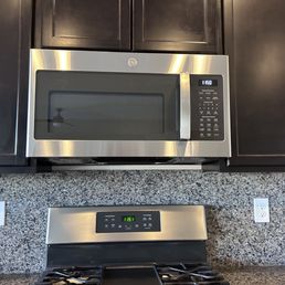 New GE microwave in place. New GE microwave in place.