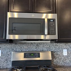 Green Valley Home Solutions - New GE microwave in place.
