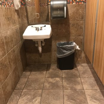 Popeyes Louisiana Kitchen - a bathroom with a sink and trash can - Fast Food Near Me - Memphis, Tennessee Popeyes Louisiana Kitchen - a bathroom with a sink and trash can - Fast Food Near Me - Memphis, Tennessee