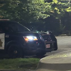 Grand Laundromat - The worker smashed a customer's finger in the washer so the customer called the police.