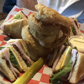 Tiki Beach Bar and Grill - Club Sándwich with onion rings - Seafood Near Me - Crystal Beach, Texas Tiki Beach Bar and Grill - Club Sándwich with onion rings - Seafood Near Me - Crystal Beach, Texas