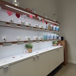skoah facial shop Phoenix -- Paradise Valley - Product wall decorated for Valentine's Day