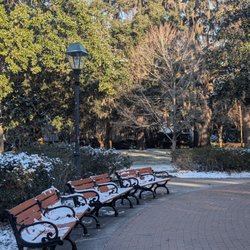 Forsyth Park - Snowy park benches around the fountain