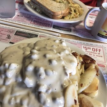 Sunshine Cafe - country eggs in the background, sausage gravy and biscuits in the foreground - Breakfast & Brunch Near Me - Royersford, Pennsylvania