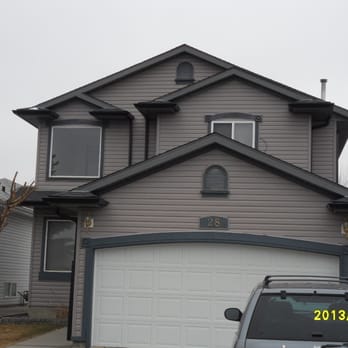 Big Top Roofing & Exteriors - a grey house - Roofing Near Me - Calgary, Alberta Big Top Roofing & Exteriors - a grey house - Roofing Near Me - Calgary, Alberta