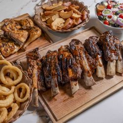 Grillado's - Dive into the smoky goodness of our BBQ dishes.