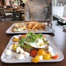 Avocado toast (front) and goat cheese omelette (back)