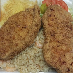 D and A Food Store - Two thick pork chop with freshly made shrimp fried rice, salad and butter toast for $8.49.