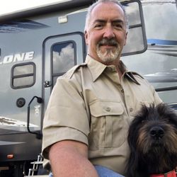 On The Road Again Mobile RV Repair Service - CiCi and me in front of our fifth wheel