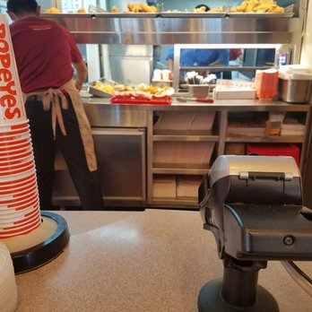 Popeyes Louisiana Kitchen - This is what I looked at for a few minutes. No acknowledgement that I was standing there. No, "I'll be with you in a minute." Nothing - Fast Food Near Me - Plano, Texas