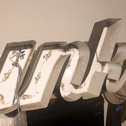 Griffin Trading Company - Advertising signage "ink". Ready for clean up and display in office.