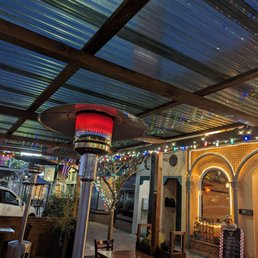Outdoor patio with heat lamps - there were several tables. Heat lamp kept us very warm on an otherwise chilly night! Outdoor patio with heat lamps - there were several tables. Heat lamp kept us very warm on an otherwise chilly night!