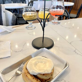 Agora Bakery and Cafe - Cinnamon Roll was good but a little too dense - Cafes Near Me - Pinehurst, North Carolina