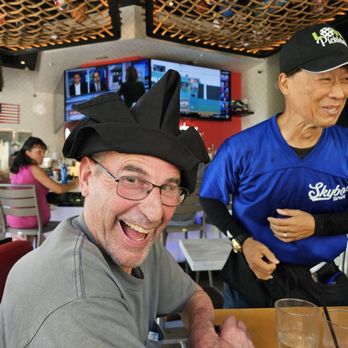 Skybox Taphouse - My hubby wearing a "hat" Todd made him from a napkin. - Pizza Near Me - Honolulu, Hawaii Skybox Taphouse - My hubby wearing a "hat" Todd made him from a napkin. - Pizza Near Me - Honolulu, Hawaii