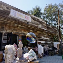 Exterior outside entrance of Topanga Rocks - Topanga Rocks storefront and assortment of large crystal and statuary pieces - Topanga, California Exterior outside entrance of Topanga Rocks - Topanga Rocks storefront and assortment of large crystal and statuary pieces - Topanga, California