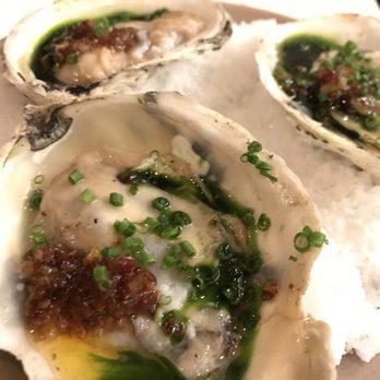 The Dabney - Grilled oysters. Just try to not fight over the last one! - New American Near Me - Washington, DC, District of Columbia